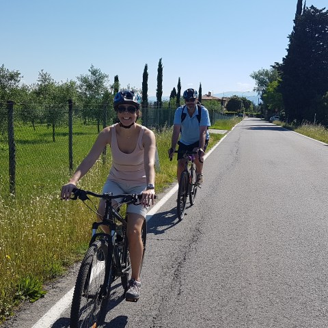 man and a woman riding bikes