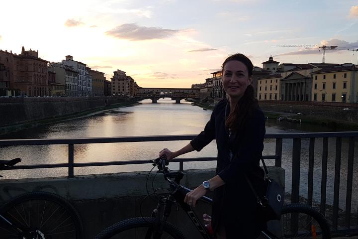 Girl on a bike during sunset
