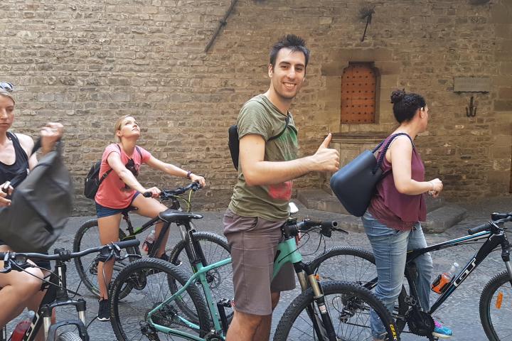 Group of people during a bike tour in Italy