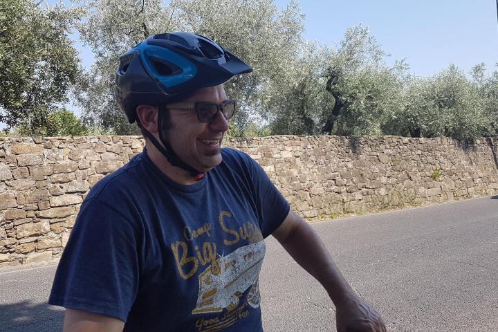 Happy customer wearing a bike helmet